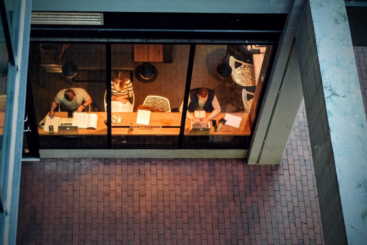 aerial view of people working in a coffee bar